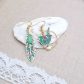 Boucles rouge-gorge et plume en liberty Donna leigh jade