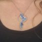 Collier loup et plume en tissu Hanako bleu