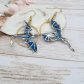 Boucles d'oreilles dragons taille moyenne en liberty Emma and Georgina bleu