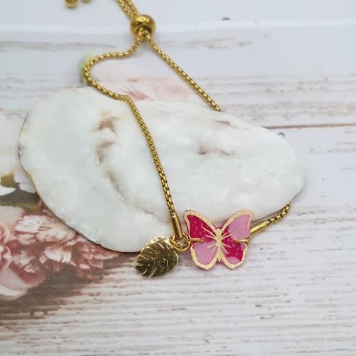 Bracelet ajustable acier doré avec papillon en TISSU Petit Pan OSAMI rose