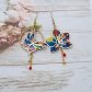 Boucles d'oreilles papillon et orchidée en liberty Thorpe Springtime