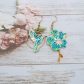 Boucles d'oreilles colibri et fleur de cerisier en petit pan calendula vert