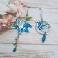 Boucles d'oreilles colibri et fleur de lys en Tissu art déco bleu