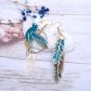 Boucles d'oreilles grand colibri et plumes en tissu émeraude fleurs dorées