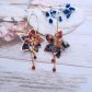 Boucles d'oreilles grandes créoles Fleurs de Tiaré en tissu liberty Thorpe rouille