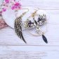 Boucles d'oreilles Phoenix et aile en liberty Erica noir