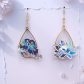 Boucles d'oreilles oiseaux inséparables et lotus en TISSU liberty Purley Meadow marine