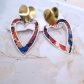 boucles d'oreilles coeurs en tissu liberty Thorpe rouille