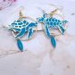 Boucles d'oreilles tortues en Tissu uni bleu Paon