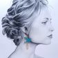 Boucles d'oreilles Lotus et grand colibri en tissu Uni bleu Paon