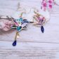 Boucles d'oreilles colibri et fleur de lys en TISSU liberty Dream of summer multicolore
