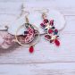 Boucles d'oreilles oiseau stylisé et fleurs de cerisier en TISSU liberty Ciara pétrole